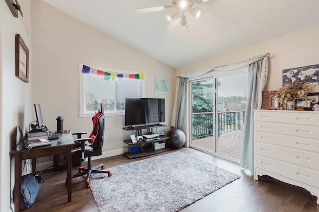 office area featuring ceiling fan, vaulted ceiling, and wood finished floors