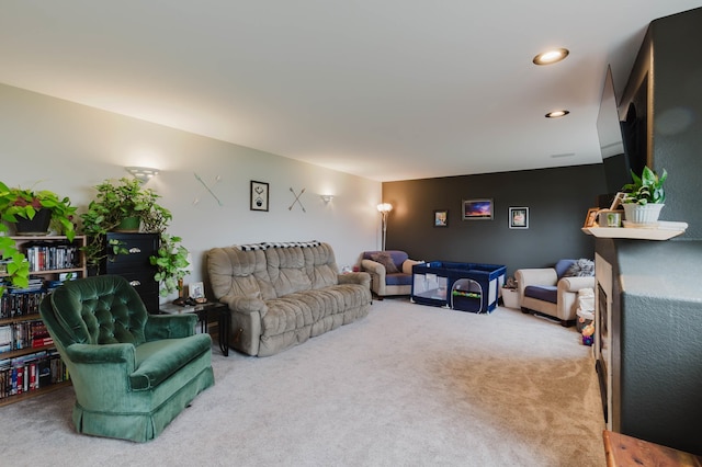 living room featuring carpet and recessed lighting