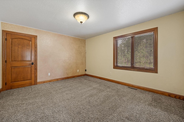 25189 Steckelberg Valley Rd, Custer, SD 57730 - spare room featuring baseboards, carpet, and visible vents