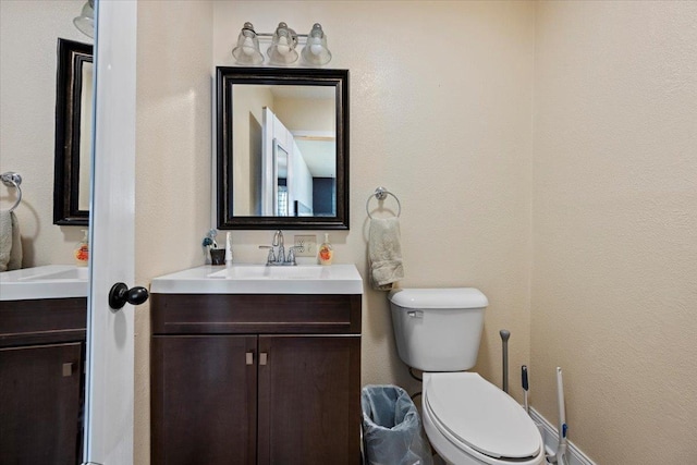 902 Yuma St, Belle Fourche, SD 57717 - bathroom with vanity and toilet