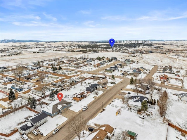 902 Yuma St, Belle Fourche, SD 57717 - snowy aerial view with a residential view
