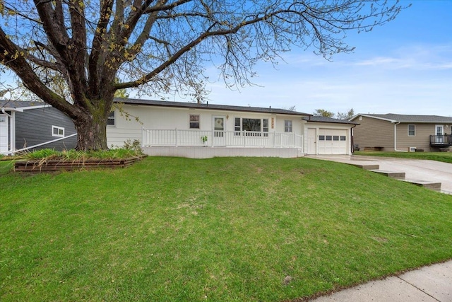 2042 12th Ave, Belle Fourche, SD 57717 - ranch-style home featuring a garage, a porch, driveway, and a front lawn
