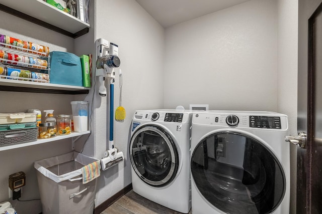 6461 Receda St, Rapid City, SD 57703 - clothes washing area with independent washer and dryer, laundry area, and wood finished floors