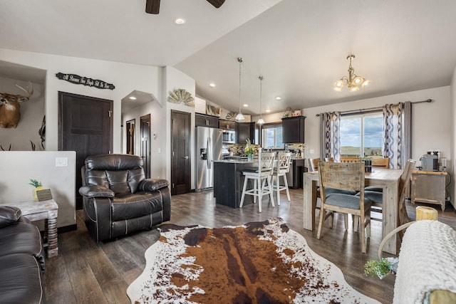 6461 Receda St, Rapid City, SD 57703 - living room featuring recessed lighting, ceiling fan with notable chandelier, lofted ceiling, and dark wood-style floors