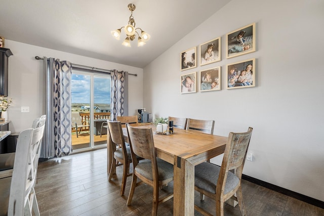 6461 Receda St, Rapid City, SD 57703 - dining room with a notable chandelier, dark wood-style floors, and vaulted ceiling