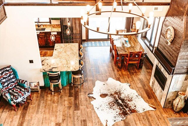 interior space featuring hardwood / wood-style flooring and visible vents