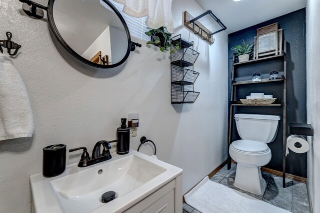 239 Deer Path, Lead, SD 57754 - bathroom featuring vanity and toilet