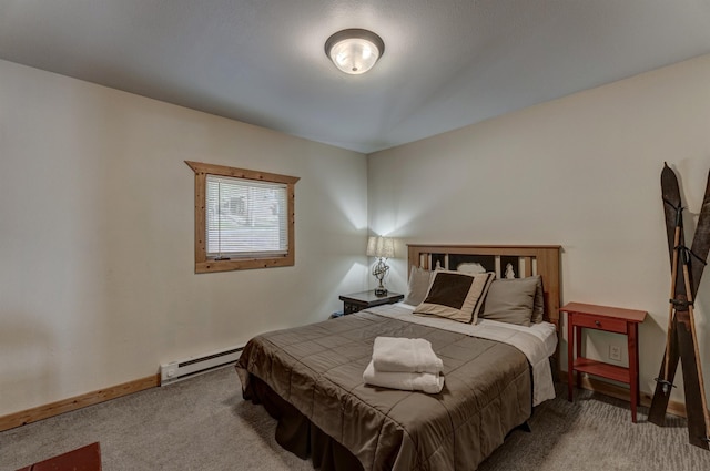 carpeted bedroom with baseboards and a baseboard heating unit