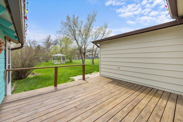1112 Elkhorn St, Belle Fourche, SD 57717 - deck with a lawn and a gazebo