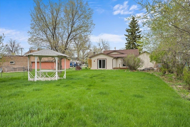 1112 Elkhorn St, Belle Fourche, SD 57717 - view of yard featuring fence and a gazebo