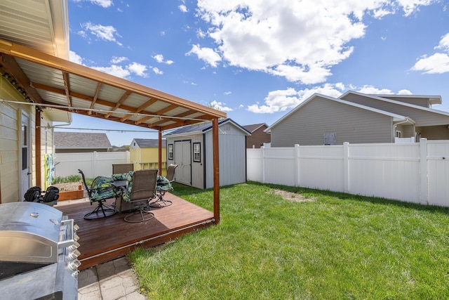 971 Northridge Dr, Rapid City, SD 57701 - view of yard featuring a fenced backyard, a wooden deck, outdoor dining area, and a shed
