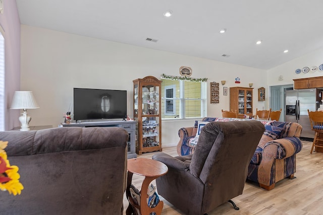 971 Northridge Dr, Rapid City, SD 57701 - living room with recessed lighting, vaulted ceiling, visible vents, and light wood finished floors