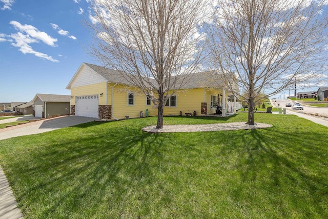 971 Northridge Dr, Rapid City, SD 57701 - view of front facade with a garage, a front lawn, and concrete driveway