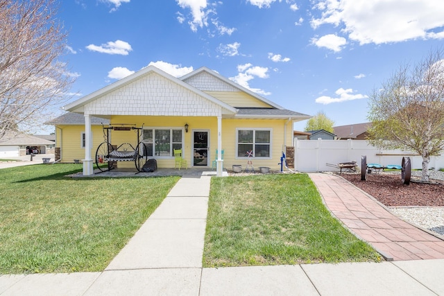 971 Northridge Dr, Rapid City, SD 57701 - view of front of home with fence and a front yard
