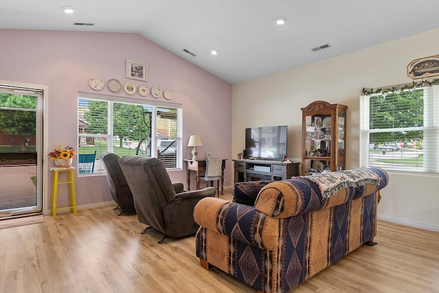 971 Northridge Dr, Rapid City, SD 57701 - living room with light wood-style floors, plenty of natural light, and visible vents