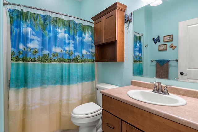 971 Northridge Dr, Rapid City, SD 57701 - bathroom featuring toilet, a textured wall, a shower with curtain, and vanity
