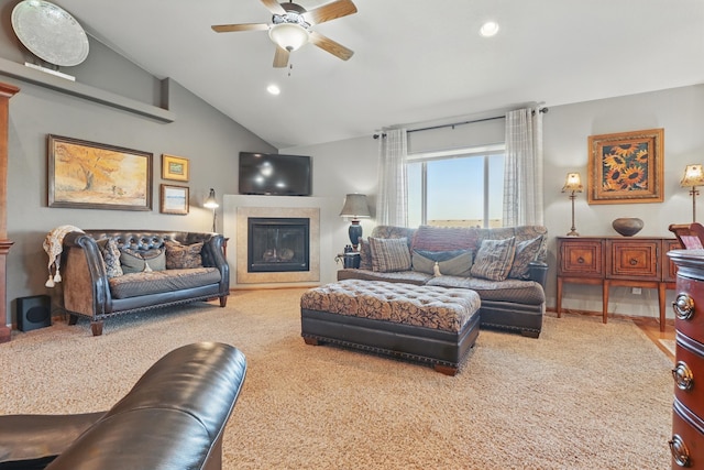 2940 Motherlode Dr, Rapid City, SD 57702 - living area with carpet floors, ceiling fan, a glass covered fireplace, vaulted ceiling, and recessed lighting