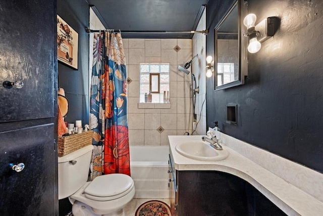 full bathroom with shower / bath combination with curtain, toilet, and vanity