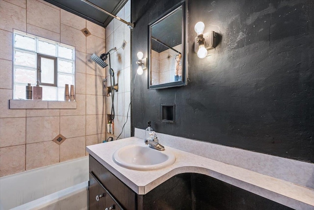 bathroom with vanity and  shower combination