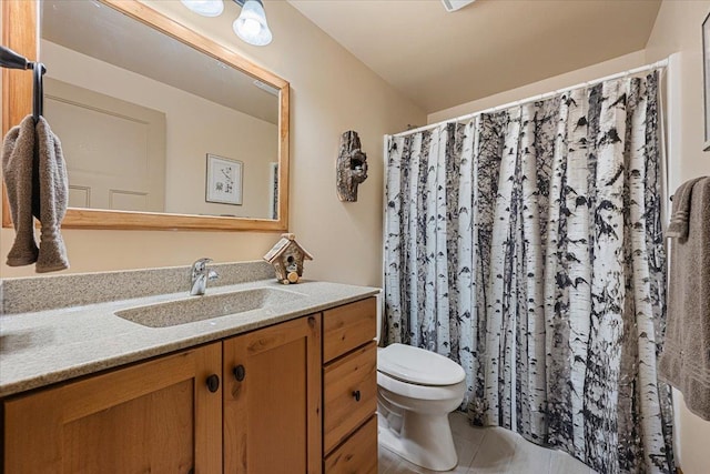 full bath with toilet, tile patterned flooring, vanity, and a shower with shower curtain