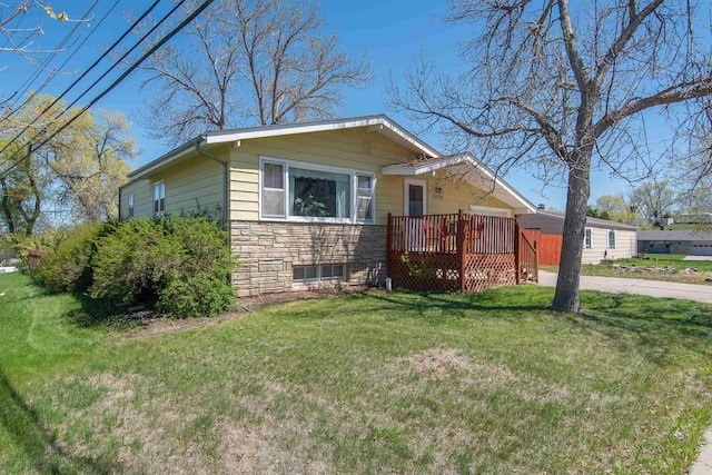 2608 Maple Ave, Rapid City, SD 57701 - view of front of home featuring a wooden deck and a front lawn