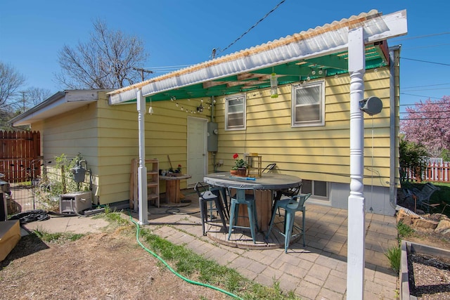 2608 Maple Ave, Rapid City, SD 57701 - back of house featuring fence, a patio, and outdoor dining space