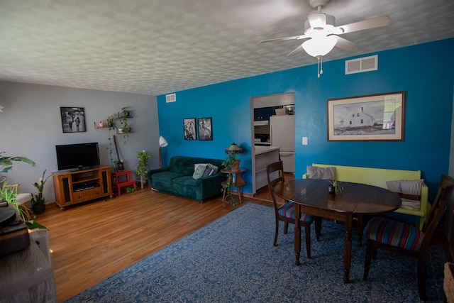 2608 Maple Ave, Rapid City, SD 57701 - dining area featuring a ceiling fan, visible vents, and wood finished floors