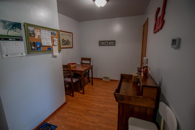 2608 Maple Ave, Rapid City, SD 57701 - hall featuring baseboards, visible vents, and light wood-style floors
