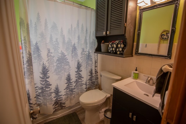 2608 Maple Ave, Rapid City, SD 57701 - bathroom with toilet, tasteful backsplash, tile walls, vanity, and a shower with shower curtain