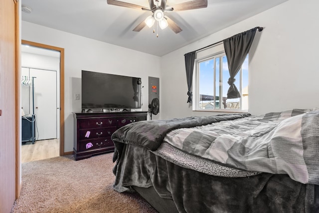 bedroom featuring a ceiling fan and carpet flooring