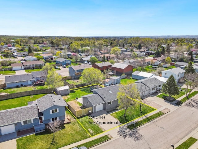 aerial view of residential area with property parcel outlined