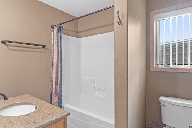 1245 Pine Cone Ln, Rapid City, SD 57701 - full bathroom featuring a sink, toilet, and shower / tub combo with curtain