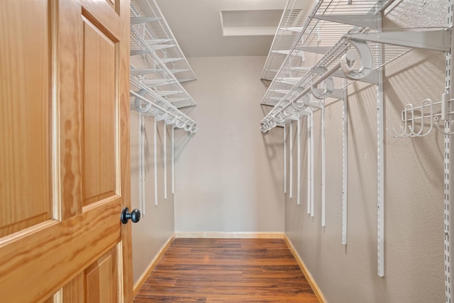 1245 Pine Cone Ln, Rapid City, SD 57701 - spacious closet featuring wood finished floors