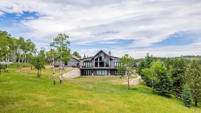 back of property featuring a chimney