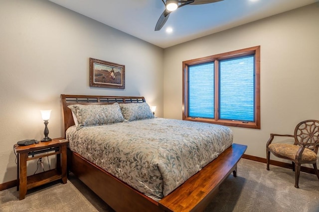 carpeted bedroom featuring baseboards, recessed lighting, and a ceiling fan