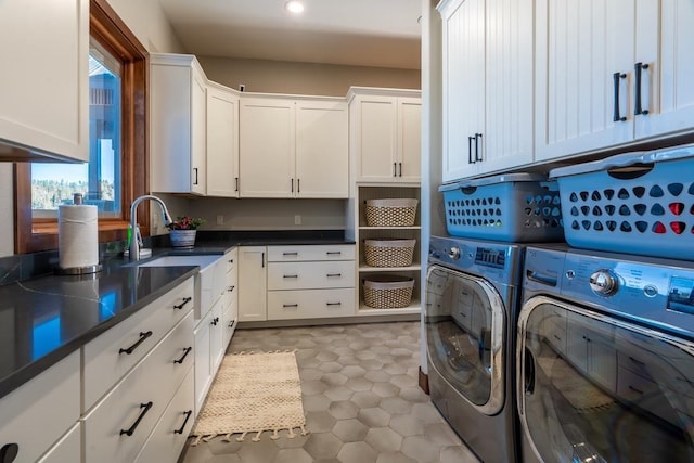 laundry area with cabinet space, washing machine and dryer, recessed lighting, and light tile patterned floors