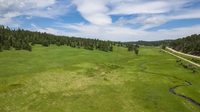 surrounding community with a forest view