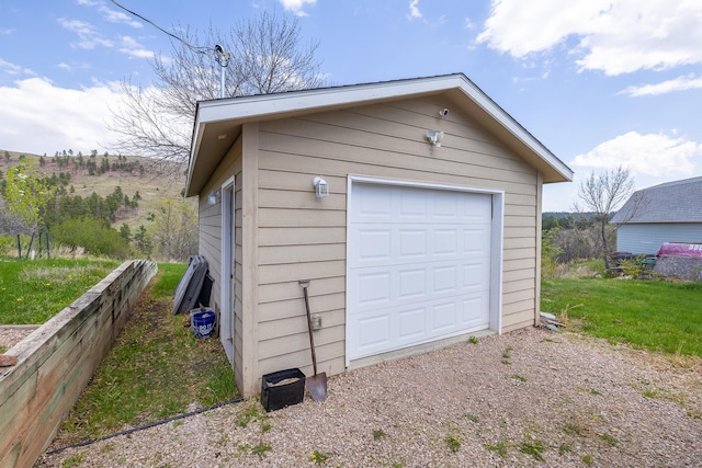 6494 Blake Rd, Rapid City, SD 57702 - detached garage featuring driveway