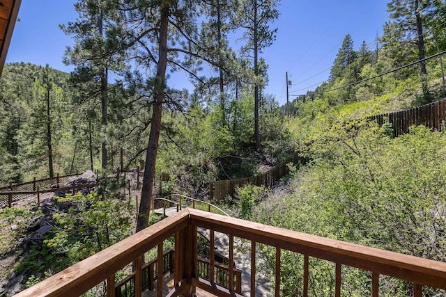 balcony with a wooded view