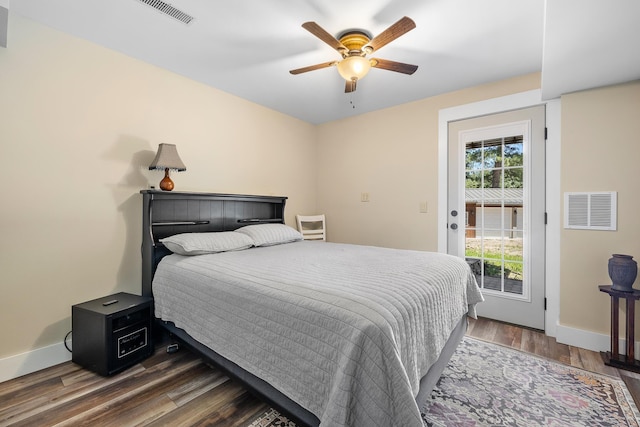 bedroom with access to outside, wood finished floors, baseboards, and a ceiling fan