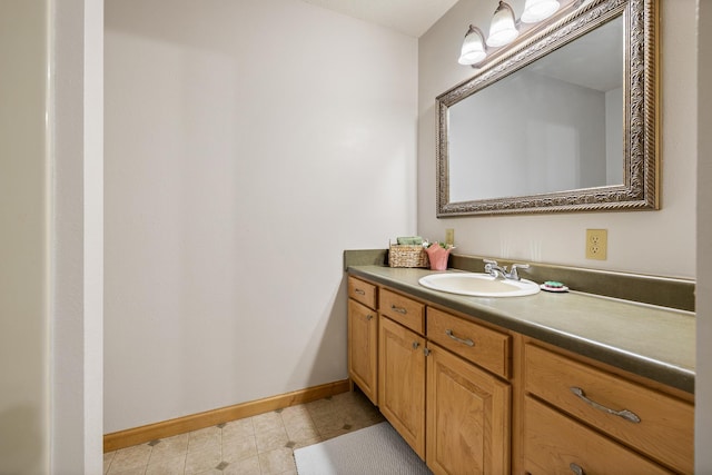 4202 Mary Dr, Rapid City, SD 57702 - bathroom featuring baseboards and vanity