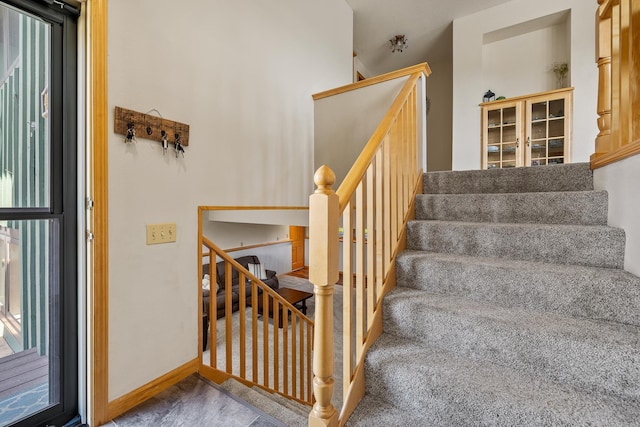 4202 Mary Dr, Rapid City, SD 57702 - stairs featuring baseboards