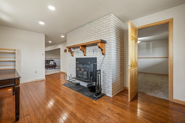 4202 Mary Dr, Rapid City, SD 57702 - living room with hardwood / wood-style flooring, baseboards, a fireplace, and recessed lighting