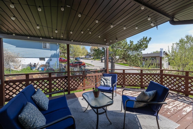 4202 Mary Dr, Rapid City, SD 57702 - wooden deck with an outdoor living space and fence