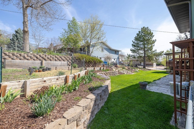 4202 Mary Dr, Rapid City, SD 57702 - view of yard with a vegetable garden