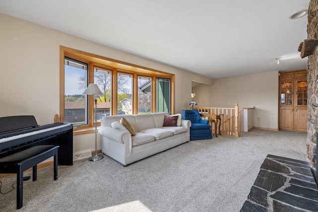 4202 Mary Dr, Rapid City, SD 57702 - carpeted living room featuring baseboards