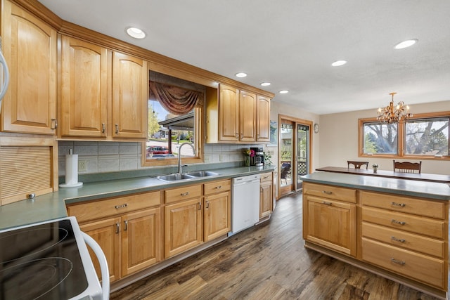 4202 Mary Dr, Rapid City, SD 57702 - kitchen with dishwasher, a sink, electric range oven, recessed lighting, and a chandelier