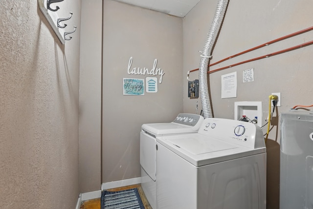 101 E Summit St, Lead, SD 57754 - washroom with washing machine and dryer and baseboards