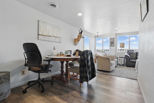 101 E Summit St, Lead, SD 57754 - dining space with wood finished floors and baseboards