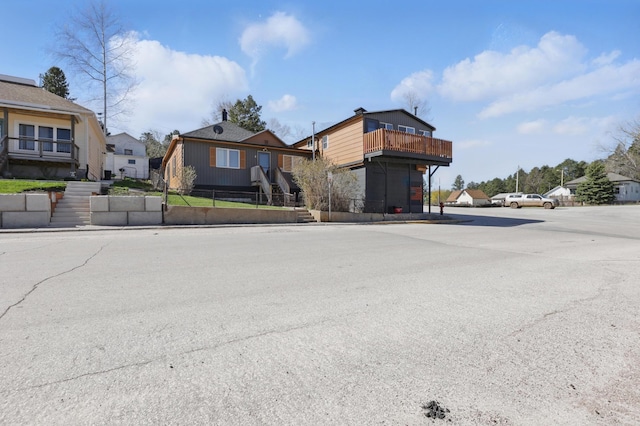 101 E Summit St, Lead, SD 57754 - view of front of property featuring a balcony and a residential view